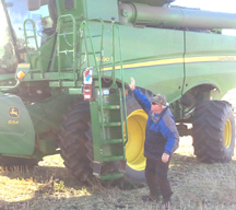 Mike James took a ride on Chris Federowich's combine in November so they could discuss the challenges Chris faces growing and harvesting seabuckthorn of the headland of his farm at Ashville, near Dauphin.